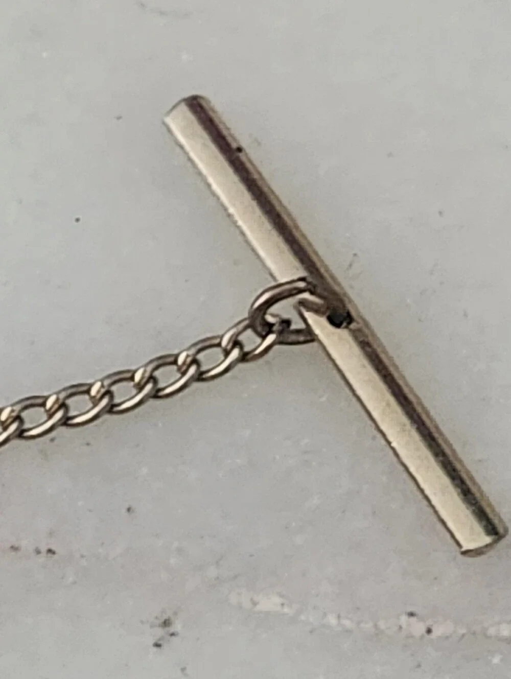 Gold-Tone Golfer Hitting Ball Figure Lapel Pin